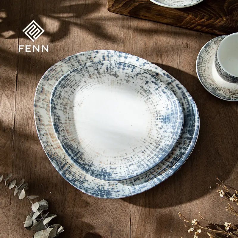 Ceramic plate system including dinner, side, and dessert plates