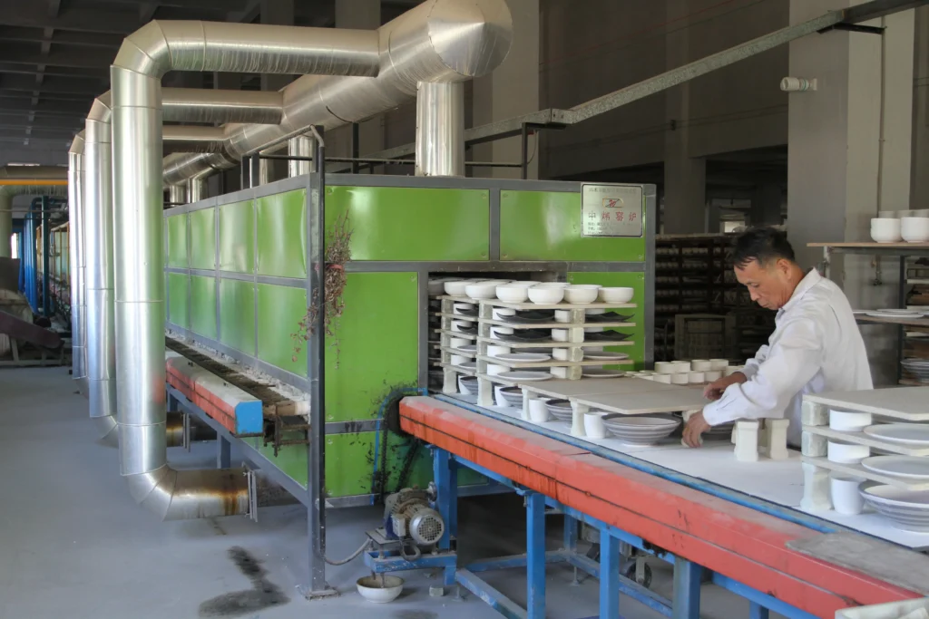 Ceramic products entering a tunnel kiln at the FENN factory