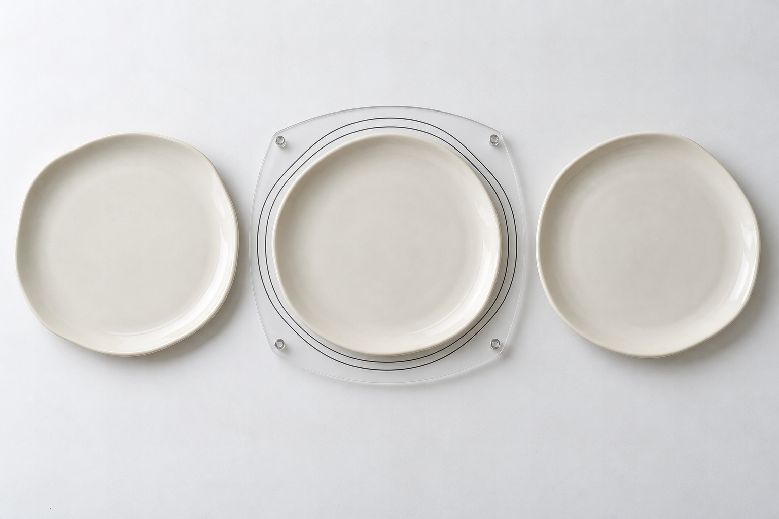 Overhead inspection of organic ceramic plates against clear outline bands for controlled shape variation in bulk production